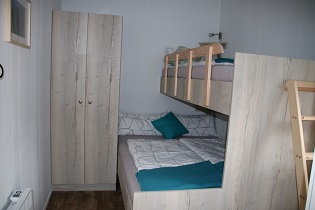 Wald-Loges Dreibettzimmer