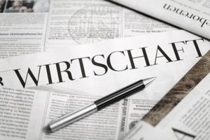 Zeitung mit Überschrift: Wirtschaft