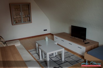 Ferienwohnung Ripper Wohnzimmer mit Schrankwand